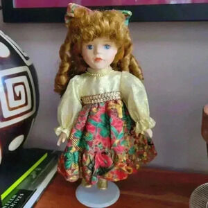 THE COLLECTORS CHOICE Porcelain Doll Blue Eyes Curly Brown Hair Floral Dress